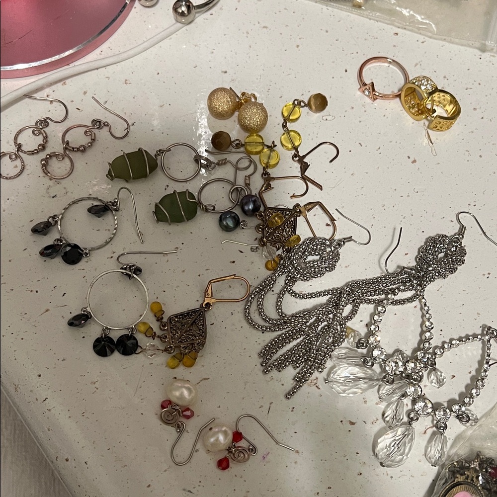 Real  Silver with silver,gold & rose gold color dangling Earrings
Not a bundle.